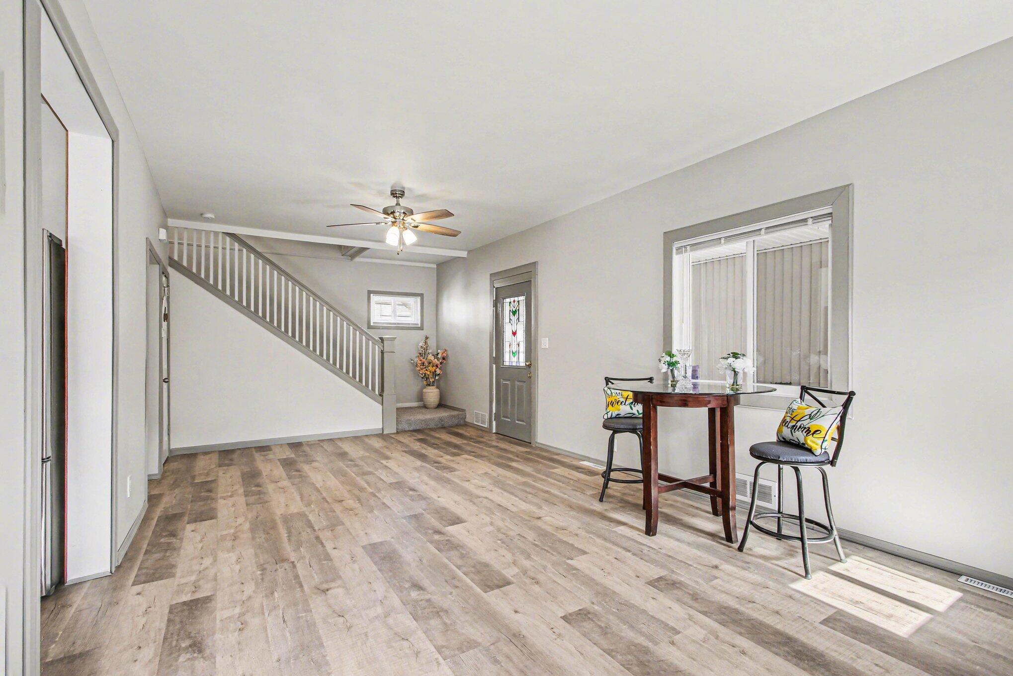 5962 Park Place Hammond, IN 46320 - Photo 6 of 20 a view of a livingroom with furniture and wooden floor