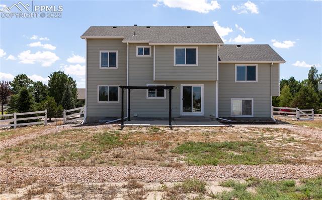 8487 Tibbs Road Peyton, CO 80831 - Photo 3 of 32 Back of house