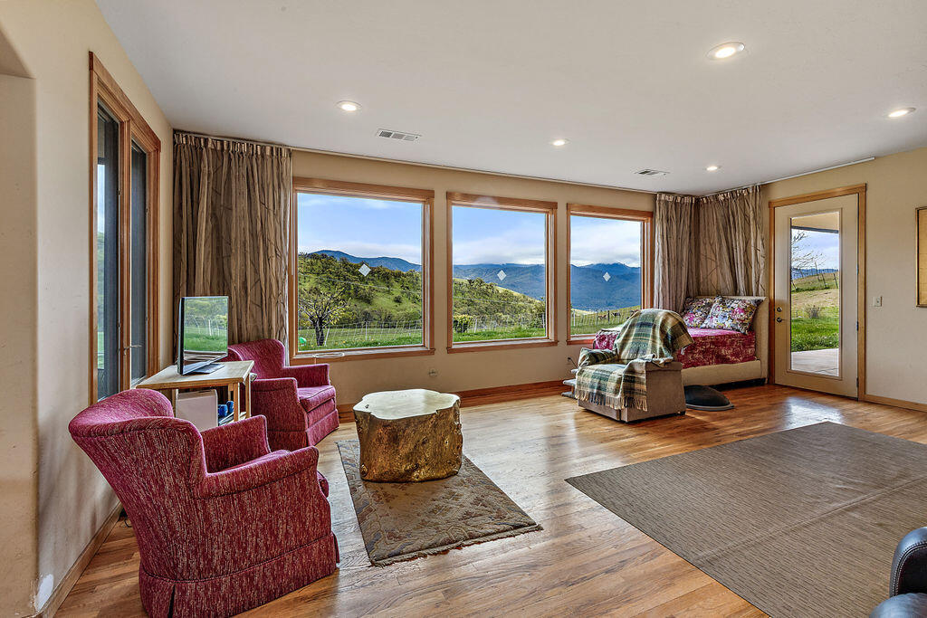 2025 Butler Creek Road Ashland, OR 97520 - Photo 12 of 49 Living room, an ideal place to watch the unexpected wildlife and birds.