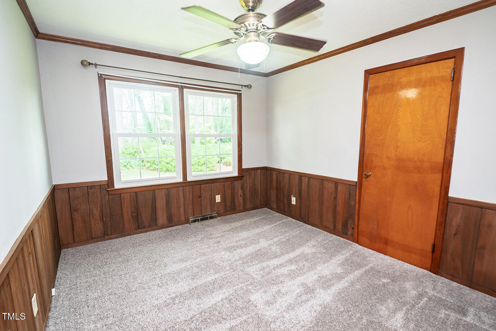 205 North Augusta Avenue Benson, NC 27504 - Photo 20 of 22 a view of an empty room with a window