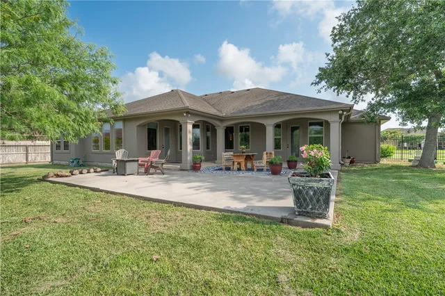 a view of a park with a tree
