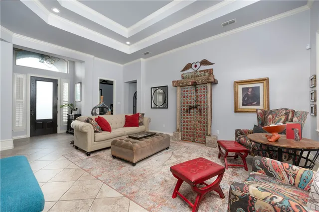 a living room with furniture and a couch