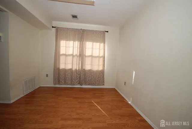 a close view of utility room with washer and dryer