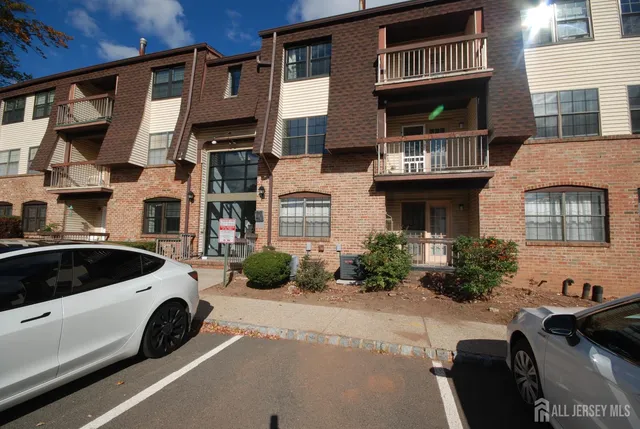 a view of a car park in front of a building