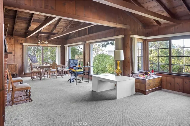 a dining room with furniture mountain and outdoor view