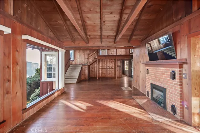 a view of entryway with wooden floor