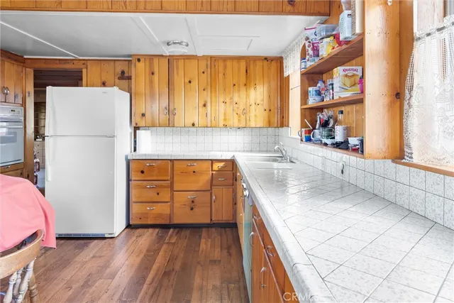a dinning area with a table and chairs