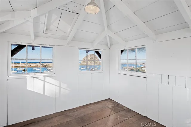 a room with a stove and a cabinet