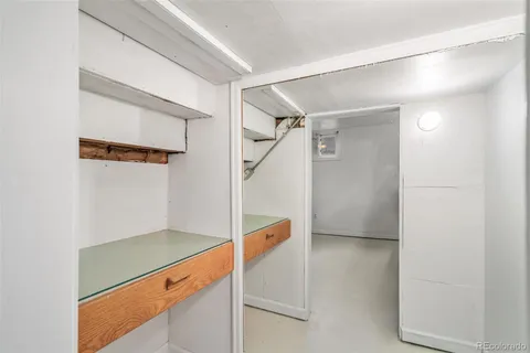 a view of an empty walk in closet