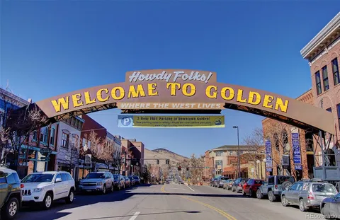 a street sign on a pole on a street