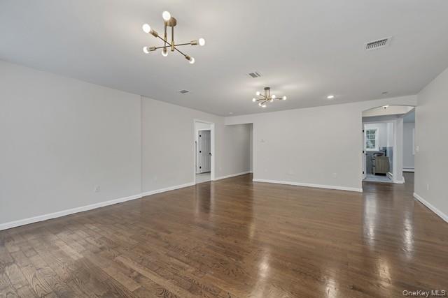 65 Old Cahoonzie Road Sparrowbush, NY 12780 - Photo 19 of 44 a view of a room with wooden floor and a ceiling fan