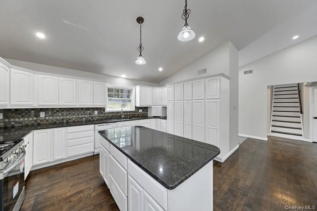 65 Old Cahoonzie Road Sparrowbush, NY 12780 - Photo 2 of 44 a kitchen with stainless steel appliances granite countertop a sink a stove and a refrigerator