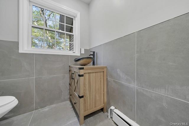 65 Old Cahoonzie Road Sparrowbush, NY 12780 - Photo 21 of 44 a bathroom with a window a toilet and a shower