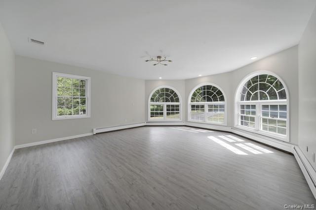 65 Old Cahoonzie Road Sparrowbush, NY 12780 - Photo 22 of 44 a view of an empty room with a window