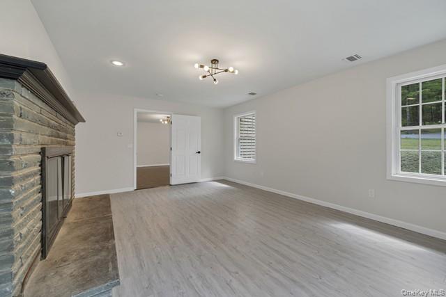 65 Old Cahoonzie Road Sparrowbush, NY 12780 - Photo 26 of 44 an empty room with windows and cabinet