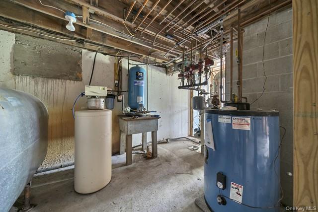 65 Old Cahoonzie Road Sparrowbush, NY 12780 - Photo 39 of 44 a view of a storage & utility room with washer and dryer