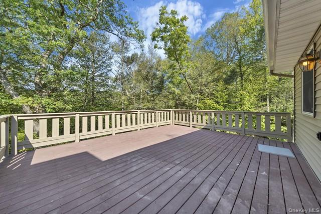 65 Old Cahoonzie Road Sparrowbush, NY 12780 - Photo 5 of 44 a view of deck with wooden floor and fence
