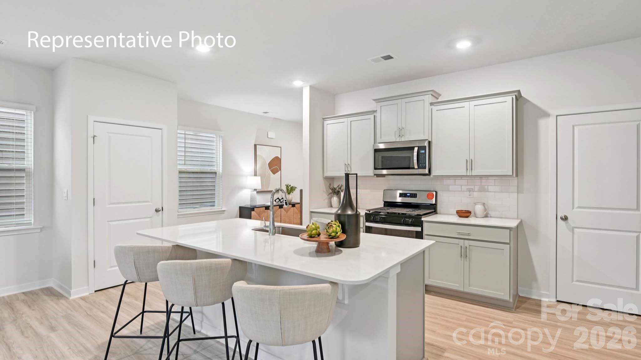 1418 Mammoth Road Hickory, NC 28602 - Photo 11 of 30 a kitchen with a sink cabinets and stainless steel appliances