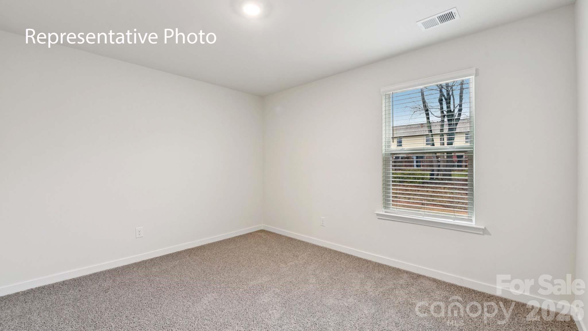 1418 Mammoth Road Hickory, NC 28602 - Photo 23 of 30 a view of an empty room with a window