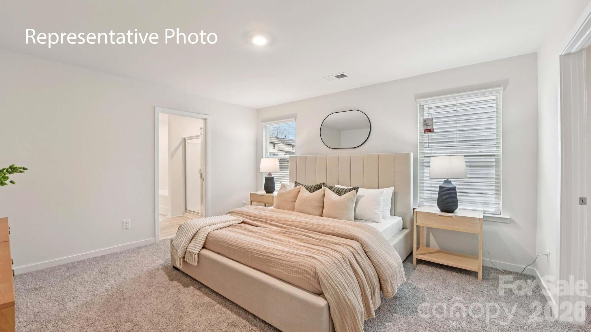 1418 Mammoth Road Hickory, NC 28602 - Photo 25 of 30 a bedroom with a bed and cabinets