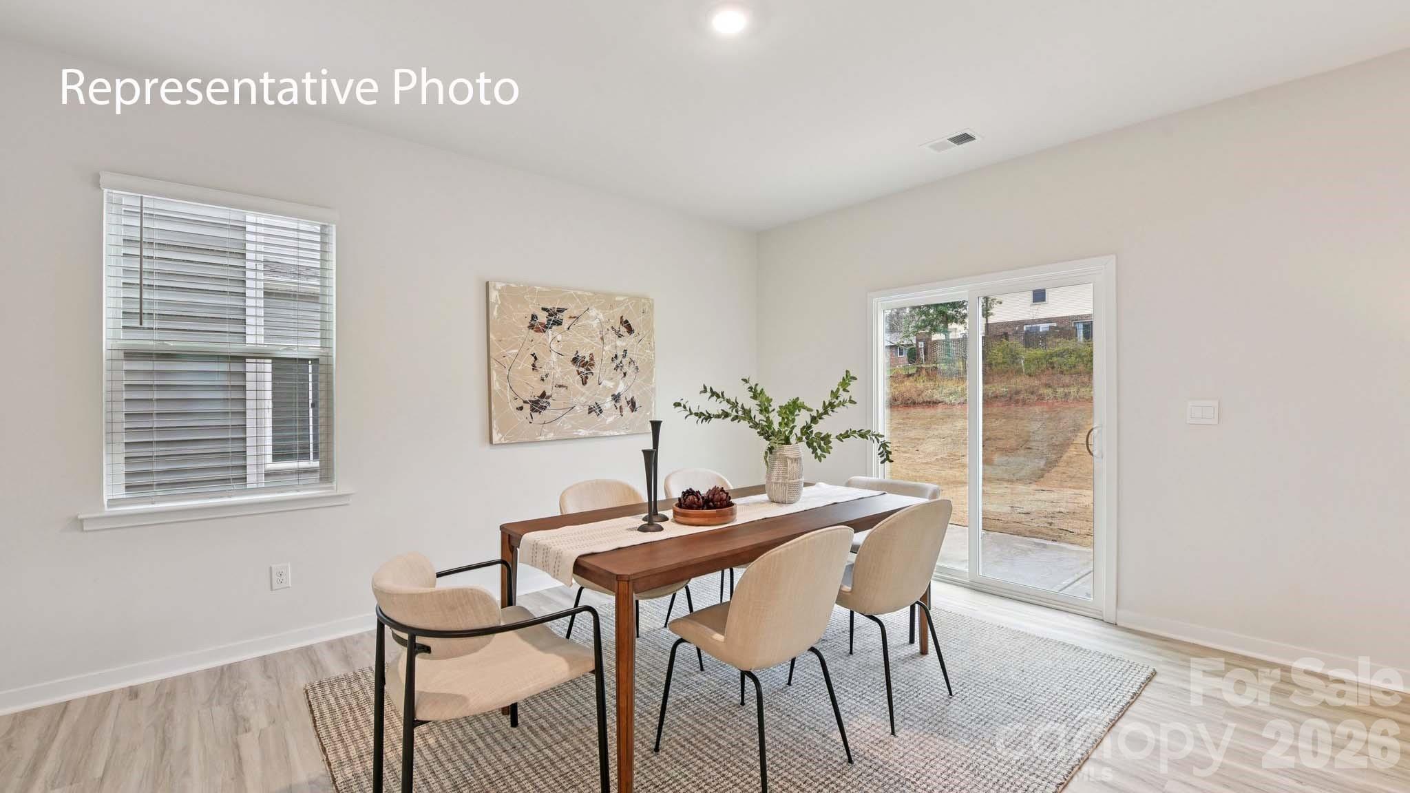 1418 Mammoth Road Hickory, NC 28602 - Photo 7 of 30 a dining room with furniture and window