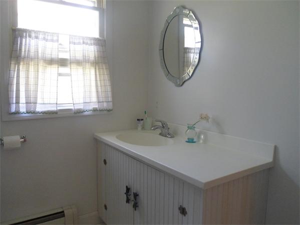 8 Finn Road Harvard, MA 01451 - Photo 8 of 22 a bathroom with a sink and a mirror