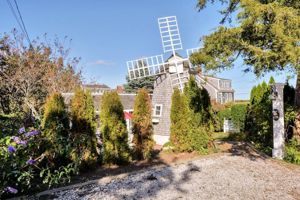 209 Shore Road, Unit 3 Chatham, MA 02633 - Photo 11 of 19 a view of a house with a tree