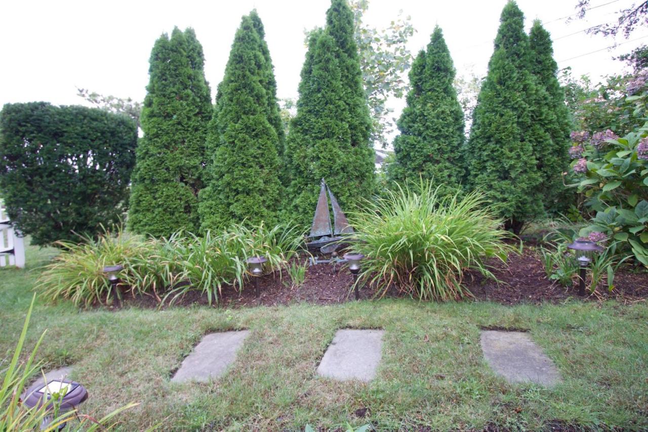 209 Shore Road, Unit 3 Chatham, MA 02633 - Photo 13 of 19 a garden view with a seating space
