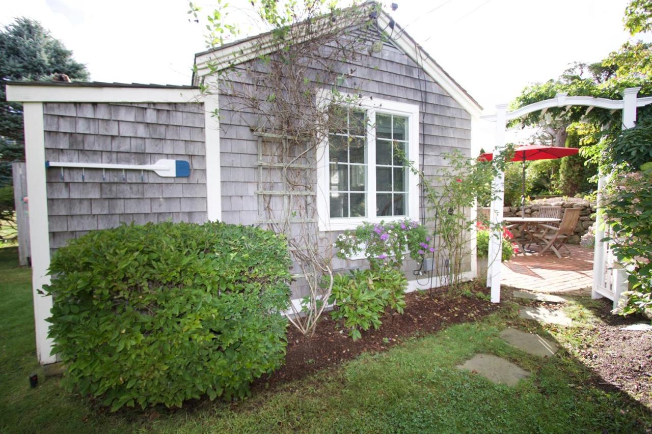 209 Shore Road, Unit 3 Chatham, MA 02633 - Photo 4 of 19 a backyard of a house with lots of green space