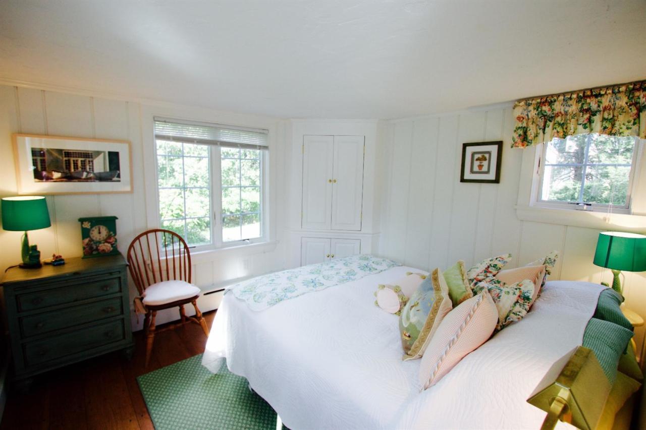 209 Shore Road, Unit 3 Chatham, MA 02633 - Photo 7 of 19 a bedroom with a bed and a couch