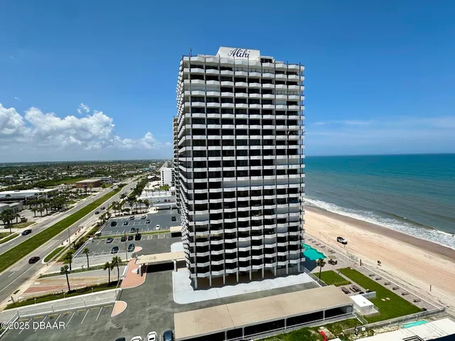 a view of a city with tall buildings