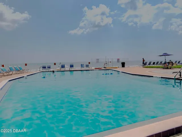 a room with green space and fog