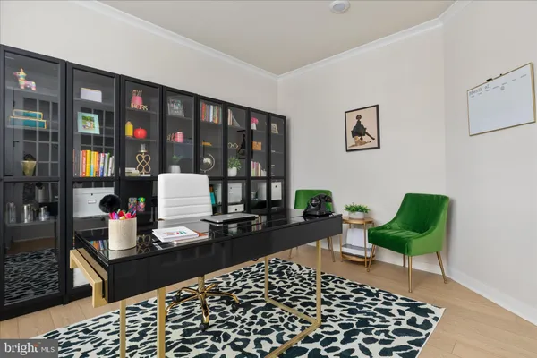 a living room with furniture and a rug