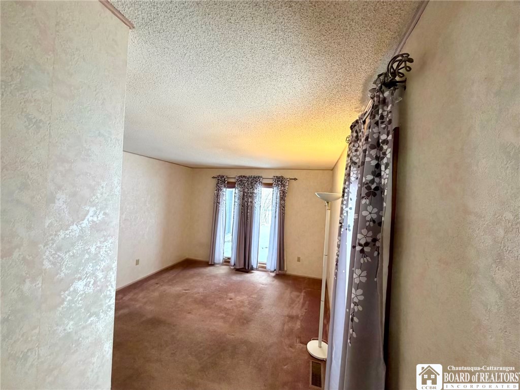 107 Frew Run Street Carroll, NY 14738 - Photo 27 of 38 Primary bedroom