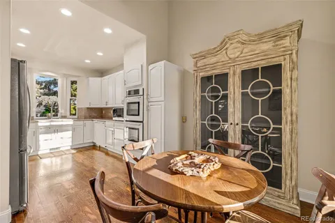 a bath tub sitting next to a window