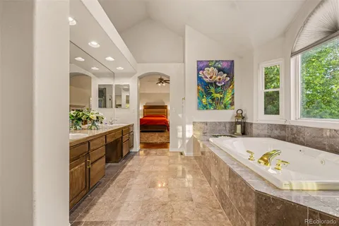 an aerial view of a house with yard