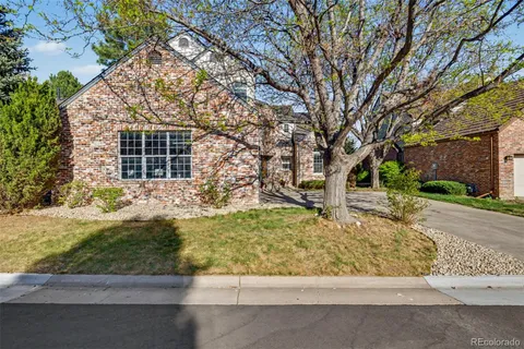 a bedroom with a bed and a mirror