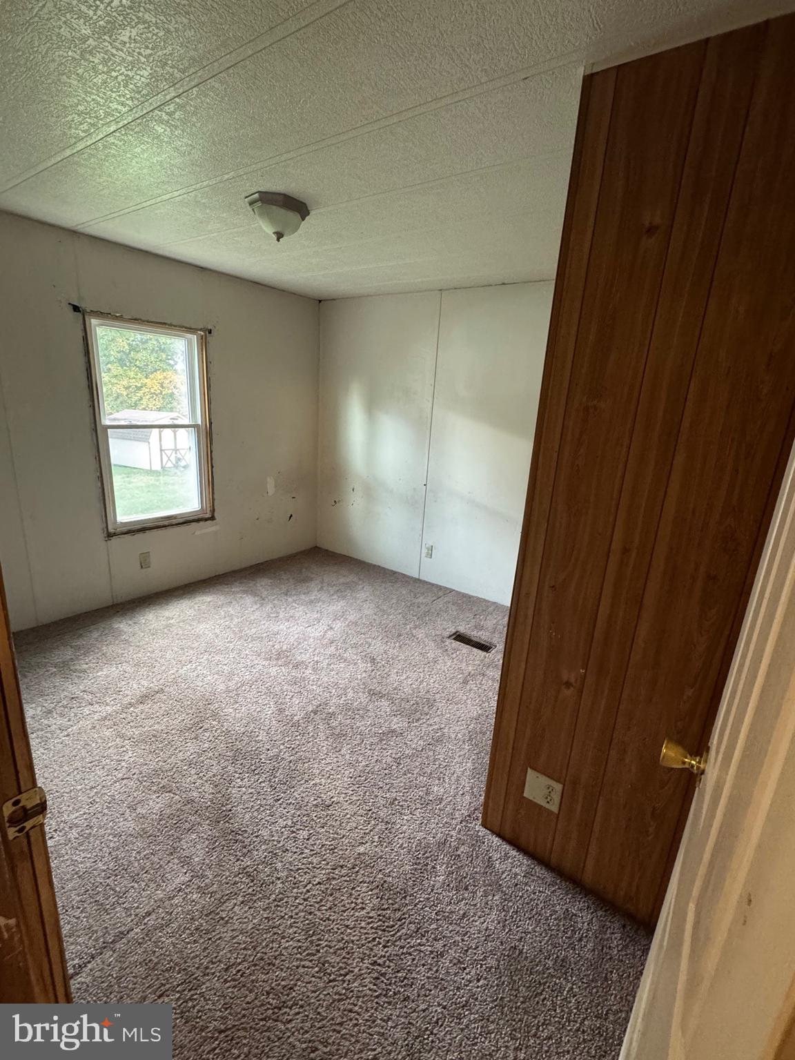 25 Hopkins Mill Road, Unit 23 New Providence, PA 17560 - Photo 10 of 14 an empty room with windows