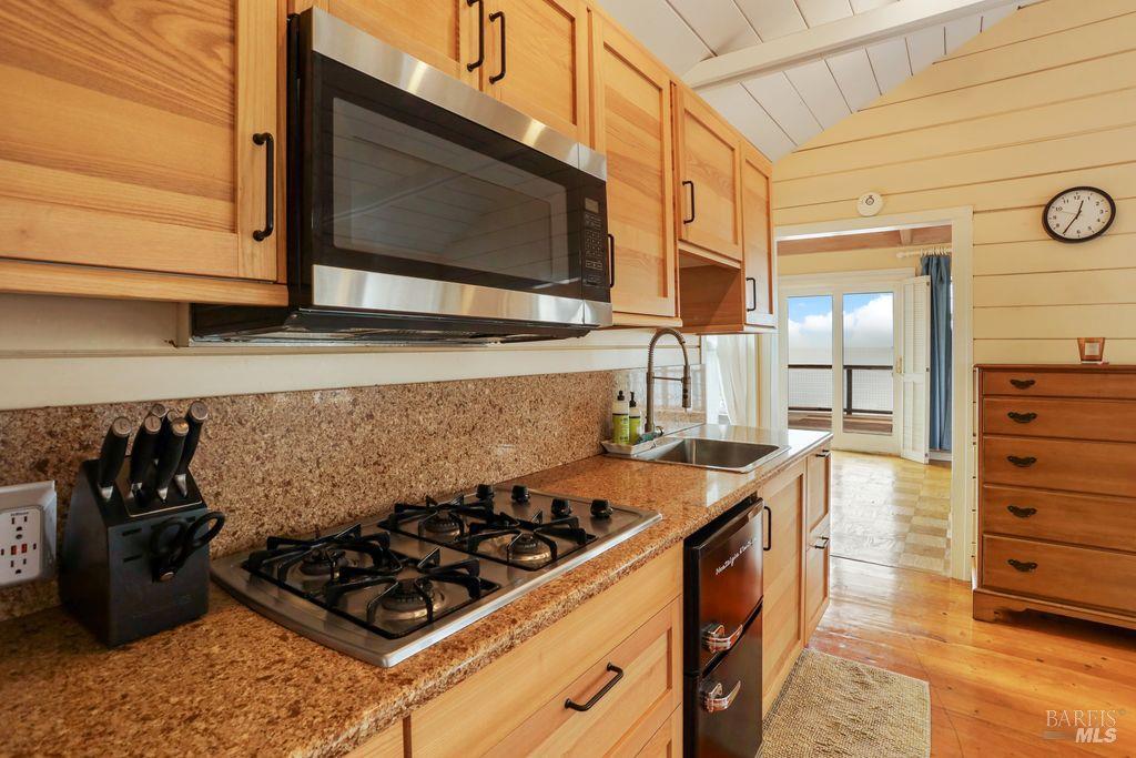 34 Sandy Beach Road Vallejo, CA 94590 - Photo 51 of 63 a kitchen with a stove and a microwave