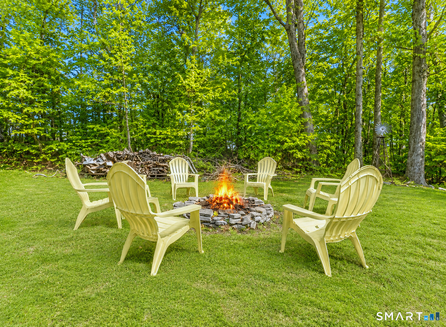 39 Freedom Drive Canton, CT 06019 - Photo 32 of 37 a view of a chairs and table in patio