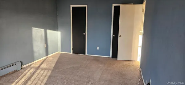 a view of a room with windows