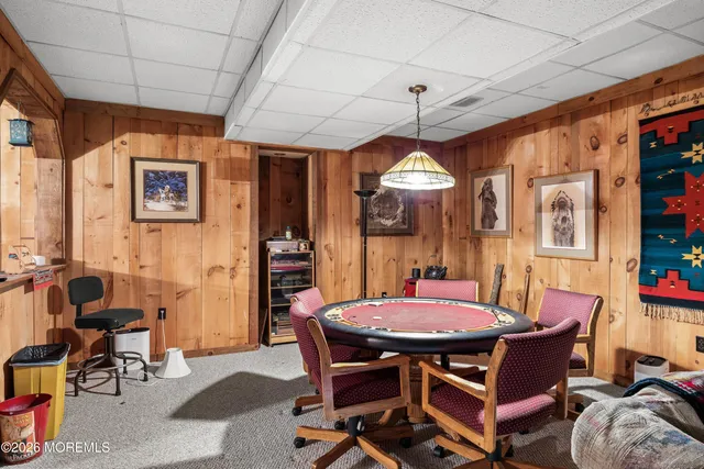 a view of a backyard with large trees