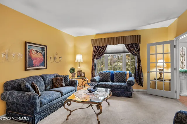 a kitchen with stainless steel appliances granite countertop a sink stove top oven and cabinets