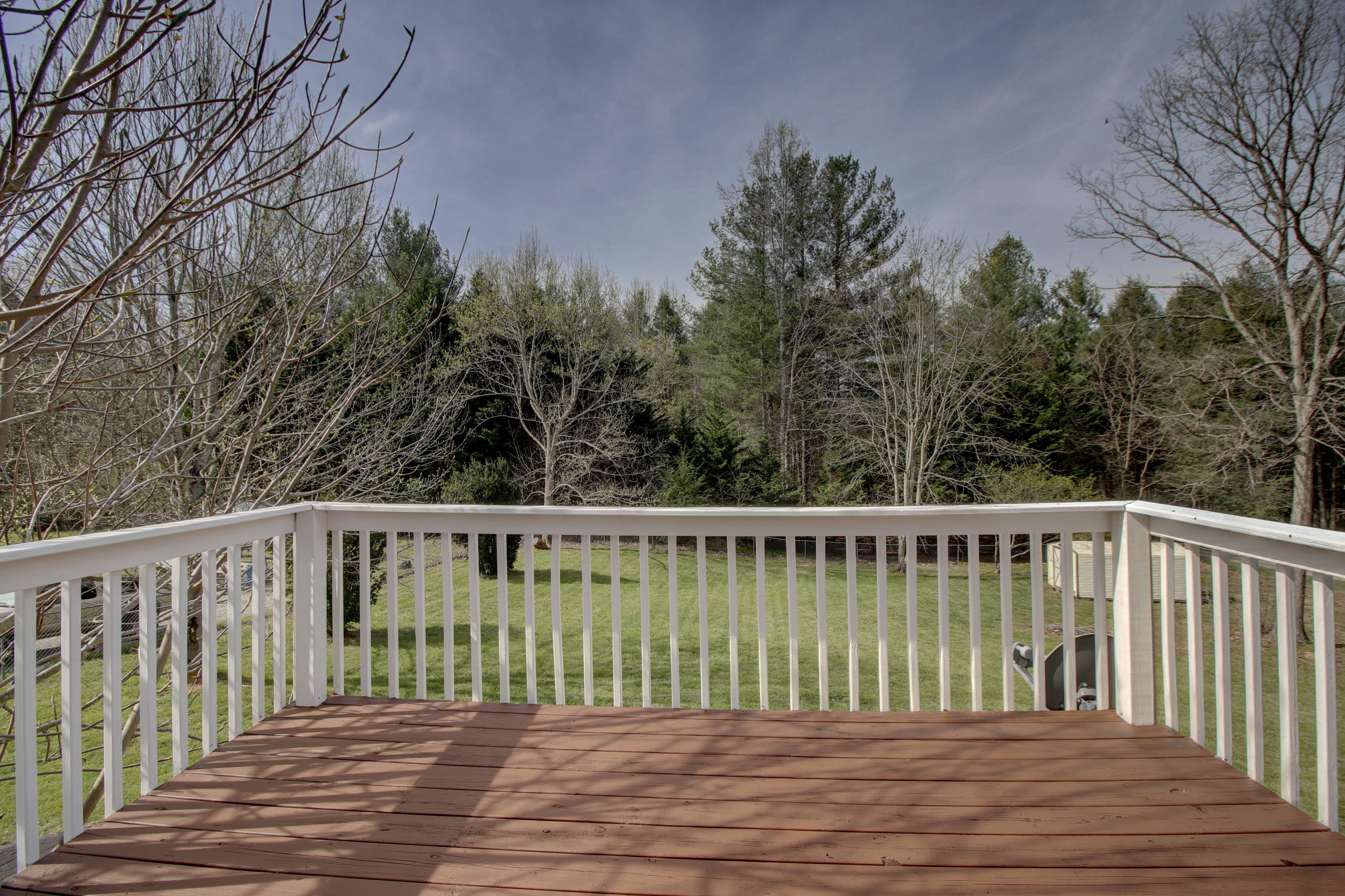 2120 Dugspur Road Callaway, VA 24067 - Photo 11 of 40 a balcony with wooden floor and fence