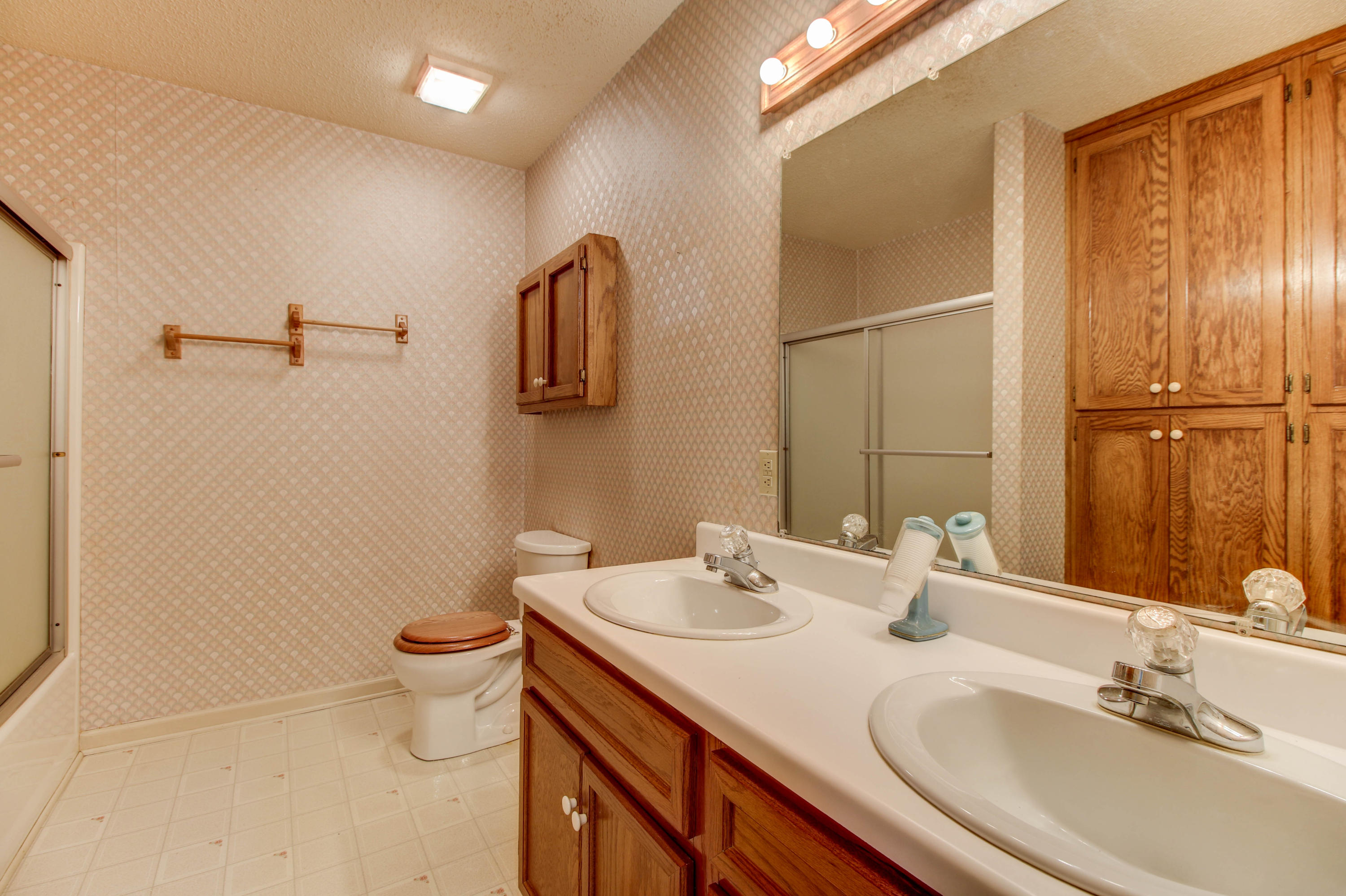 2120 Dugspur Road Callaway, VA 24067 - Photo 22 of 40 a bathroom with a sink and a mirror