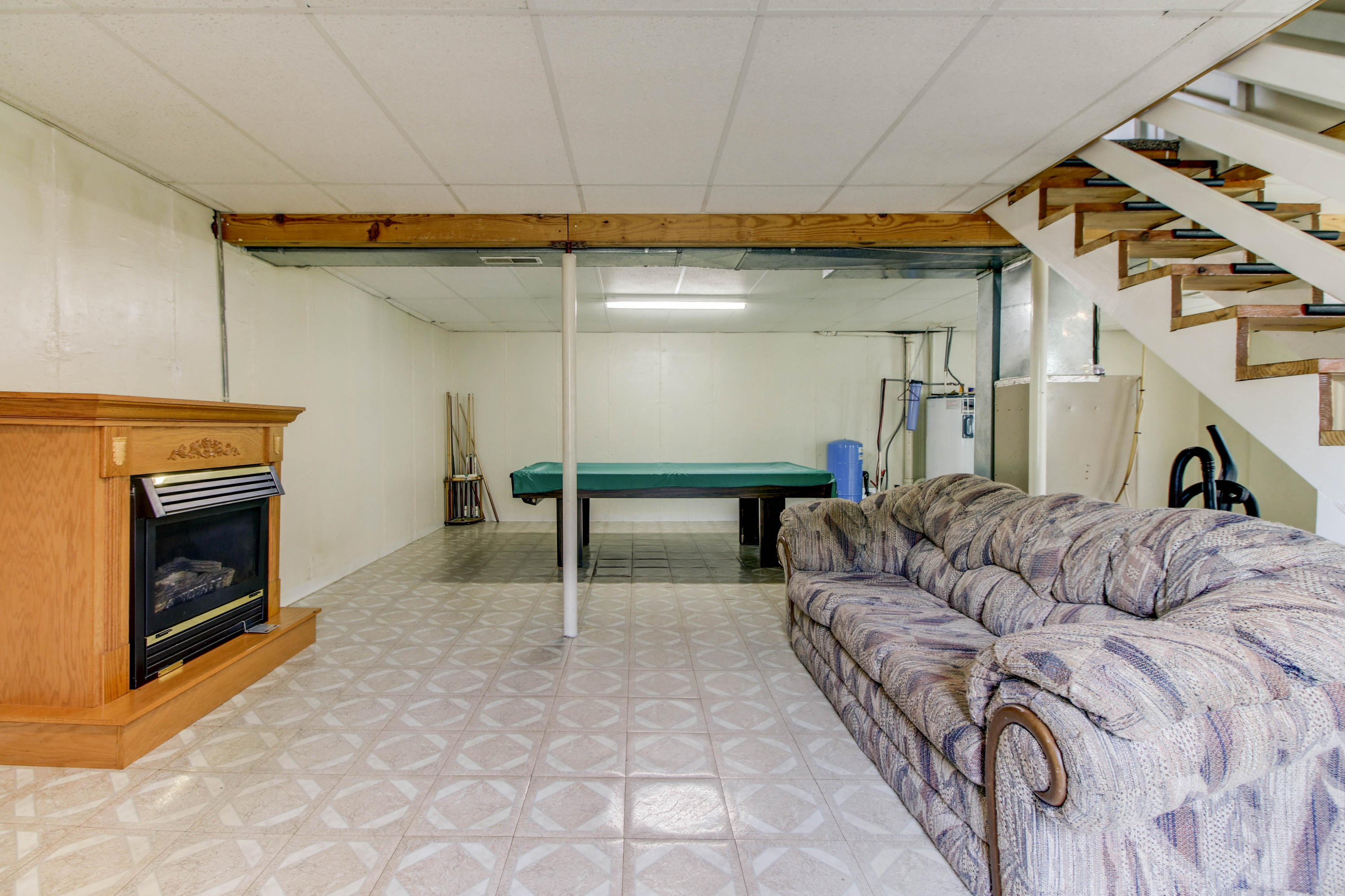 2120 Dugspur Road Callaway, VA 24067 - Photo 26 of 40 a bedroom with a bed and a fireplace
