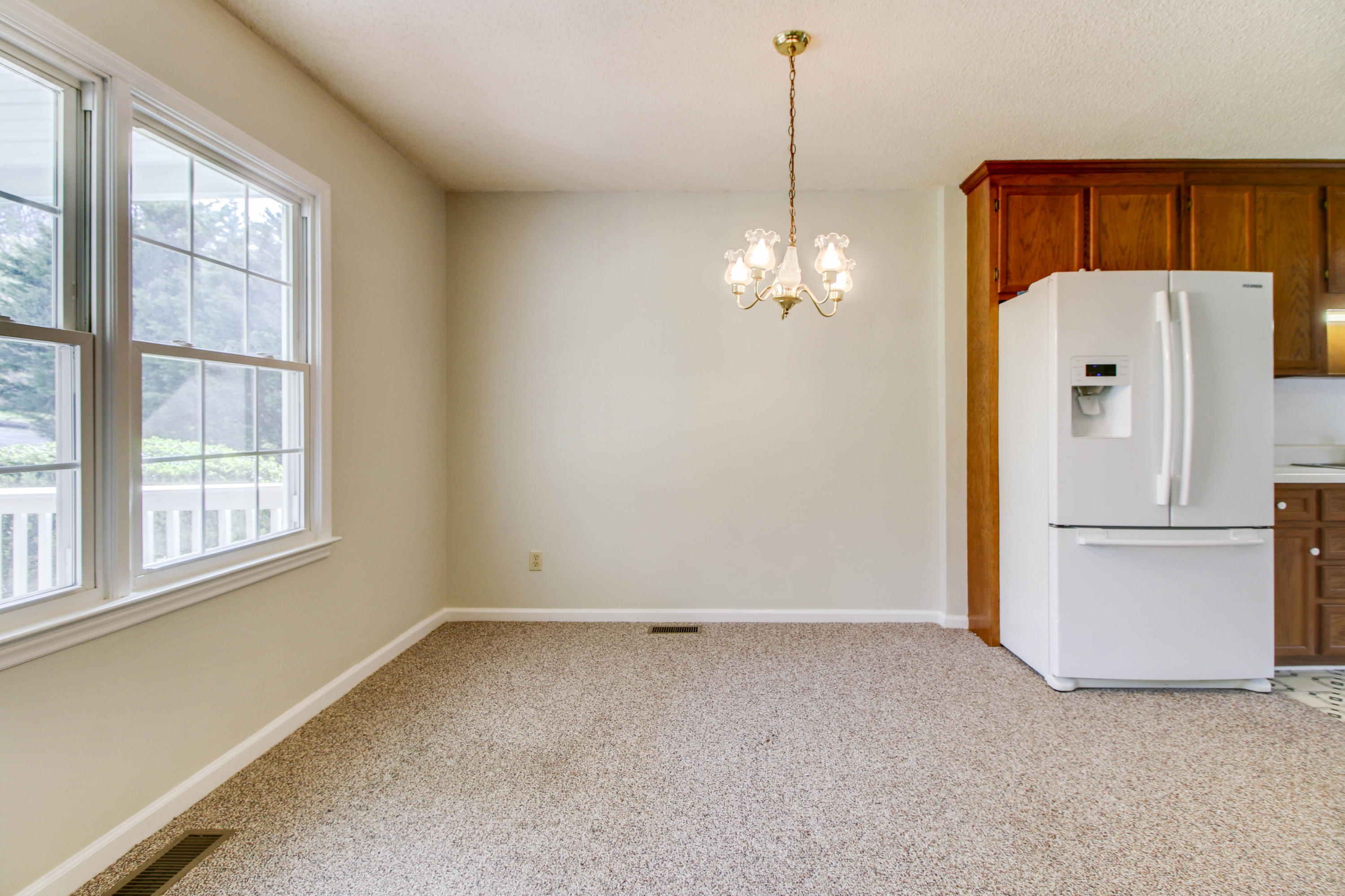 2120 Dugspur Road Callaway, VA 24067 - Photo 4 of 40 a view of a kitchen with a dishwasher cabinets and a refrigerator