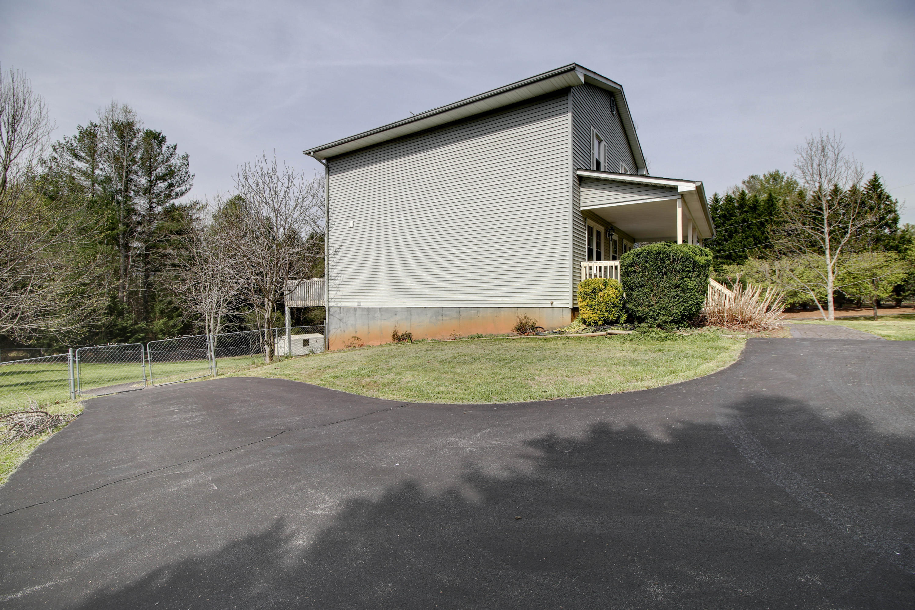 2120 Dugspur Road Callaway, VA 24067 - Photo 33 of 40 a view of a house with a yard and garage