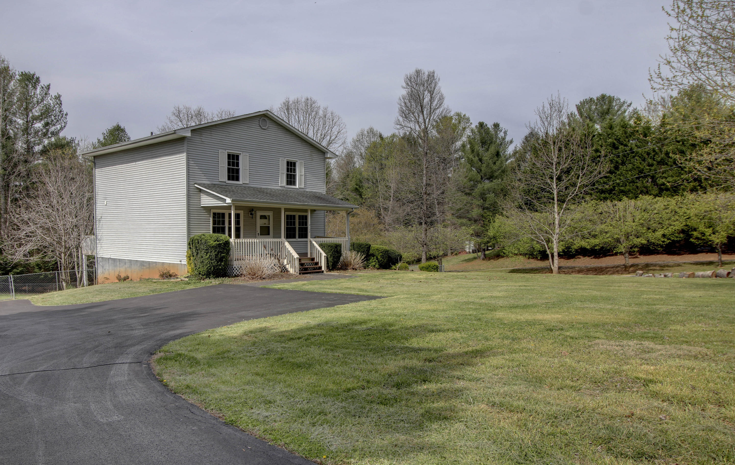 2120 Dugspur Road Callaway, VA 24067 - Photo 40 of 40 a view of a house with backyard and trees