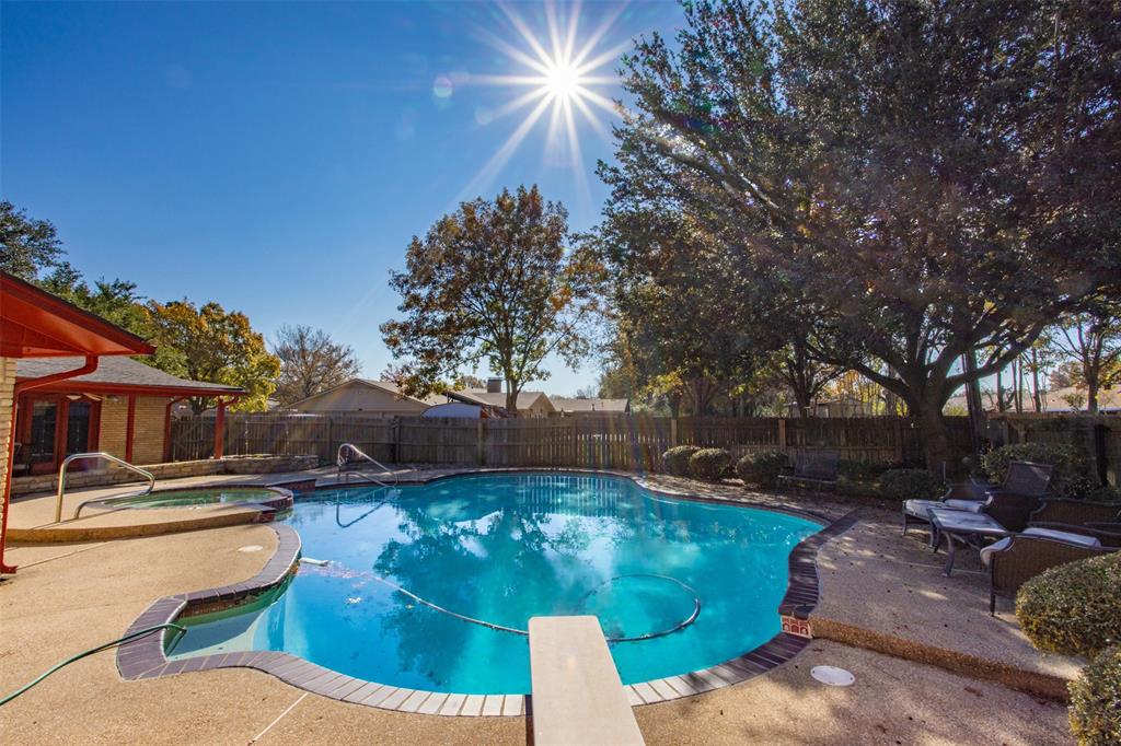 417 Willow Way Gainesville, TX 76240 - Photo 4 of 40 a view of a swimming pool with a patio
